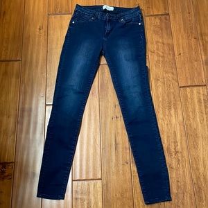 Size 28 dark blue skinny jeans runs very small